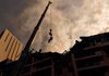 Спасательно-поисковые работы в пораженной вражеской ракетой многоэтажке в Киеве продолжаются